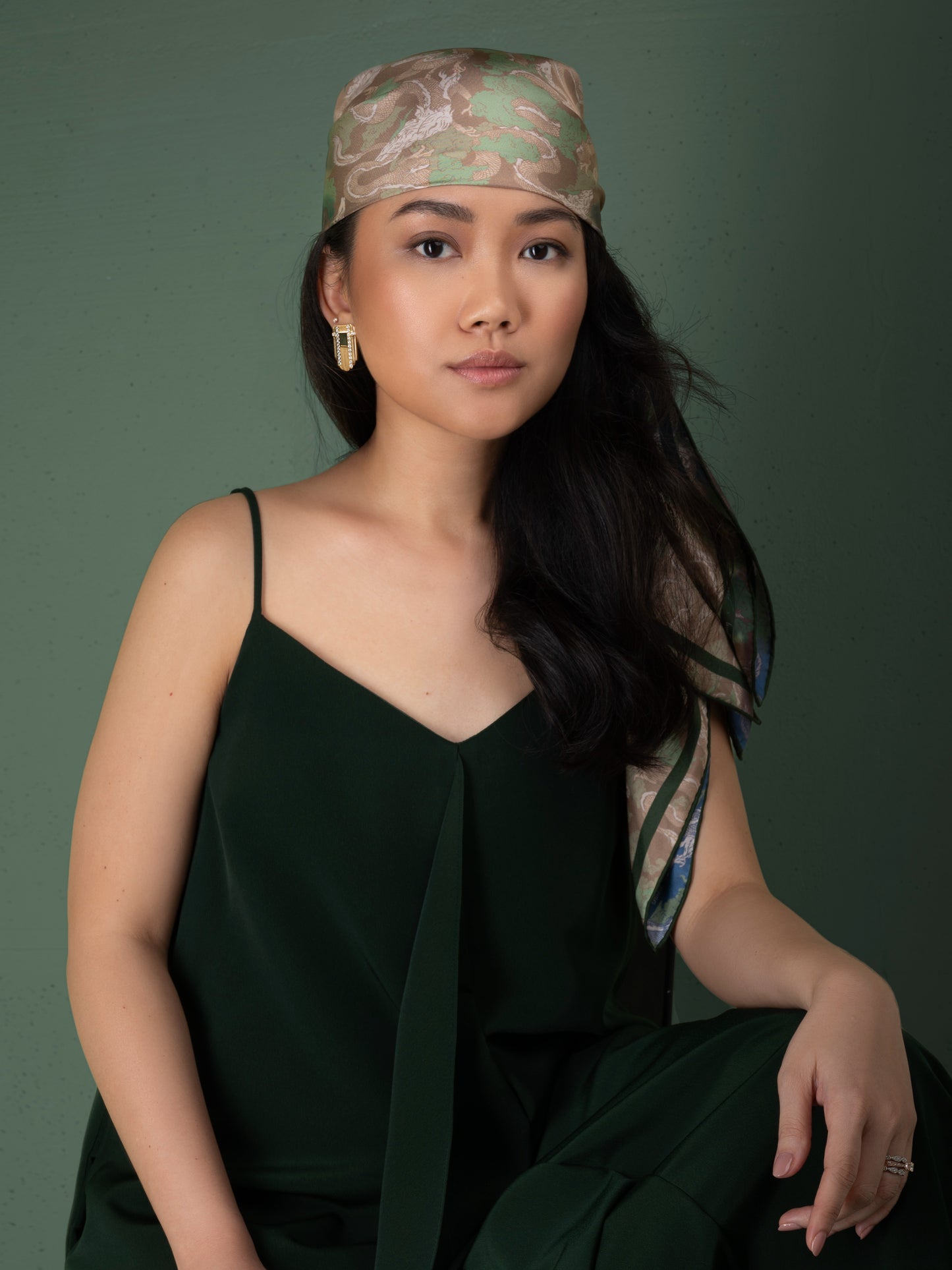 Woman wearing a silk headscarf