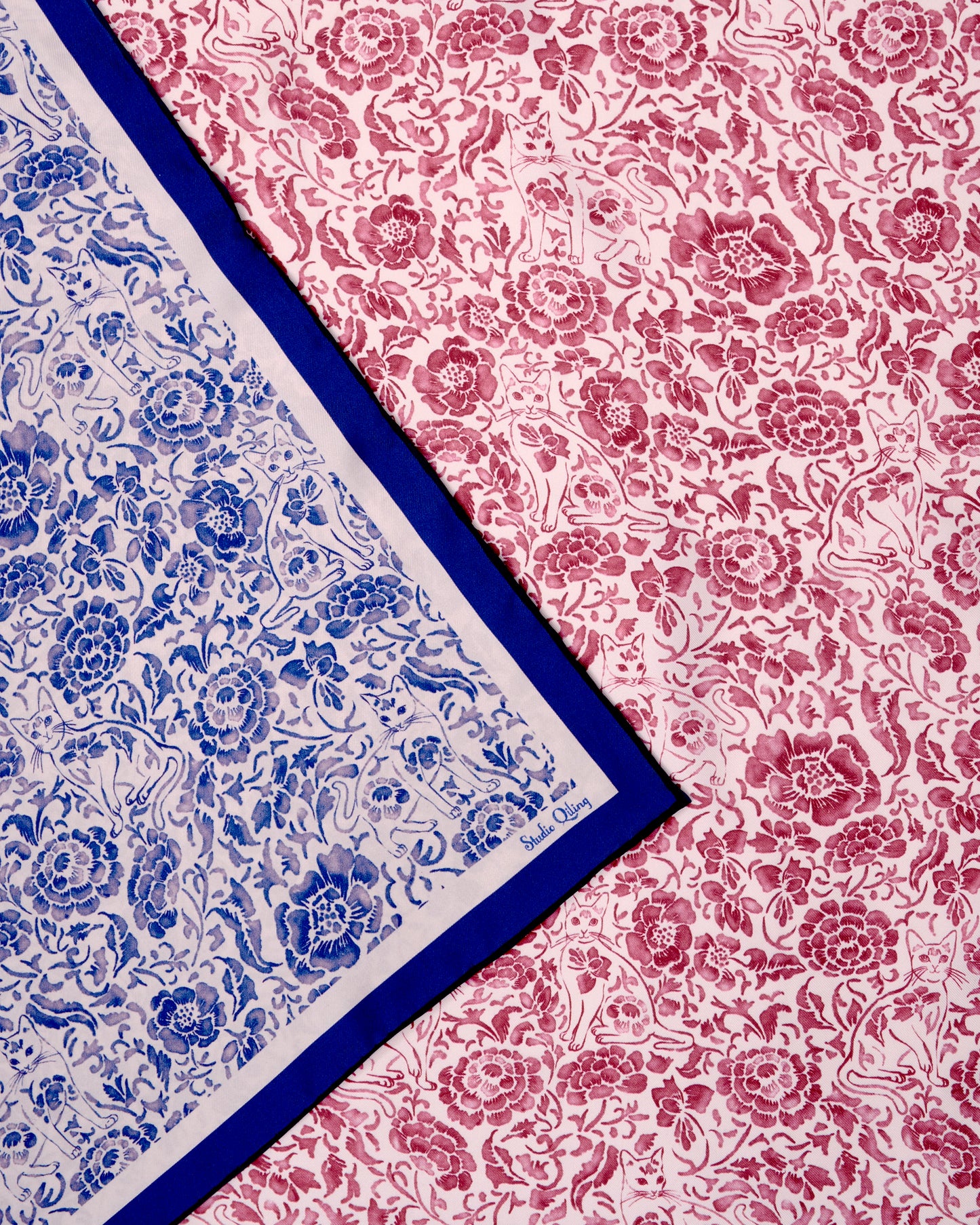 Double-sided reversible silk scarf with hand-drawn original art drawn in porcelain style with florals in red and white on one side and blue and white on the other side