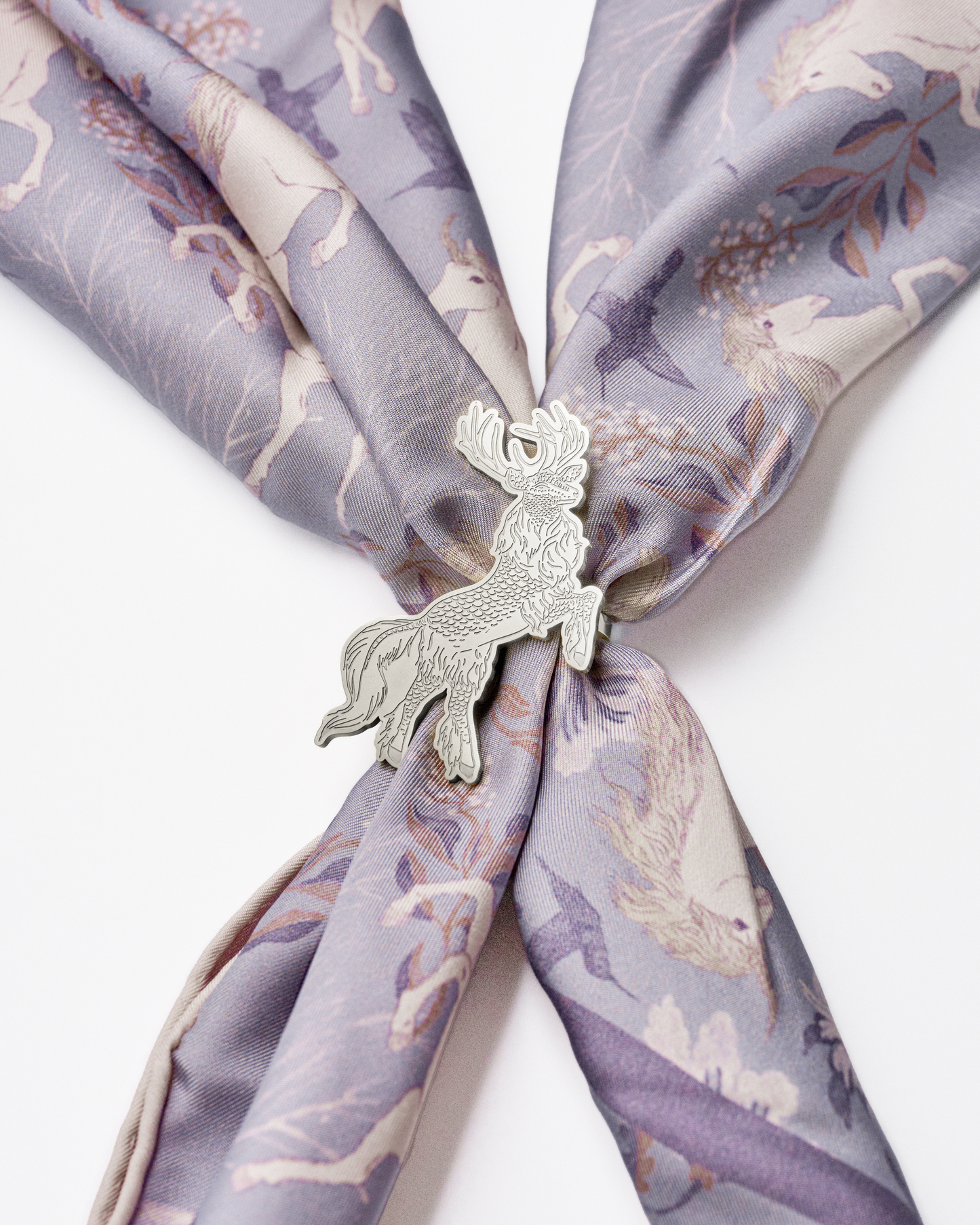 Qiling Courbette silver scarf ring flat lay with silk scarf — Studio Qiling designer reversible scarf ring Singapore