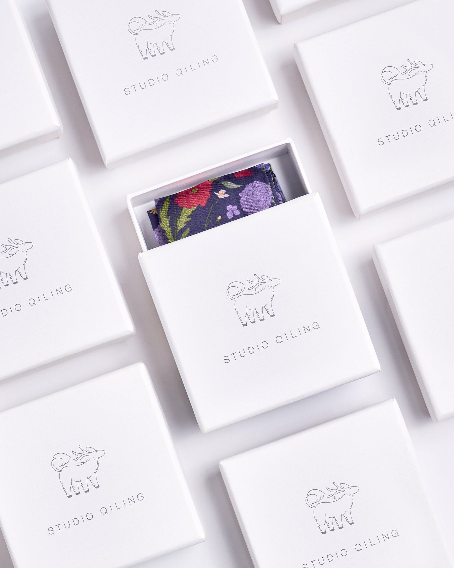 Studio Qiling luxury silk bandeau presented in a gift box — Singapore designer wearable art gift