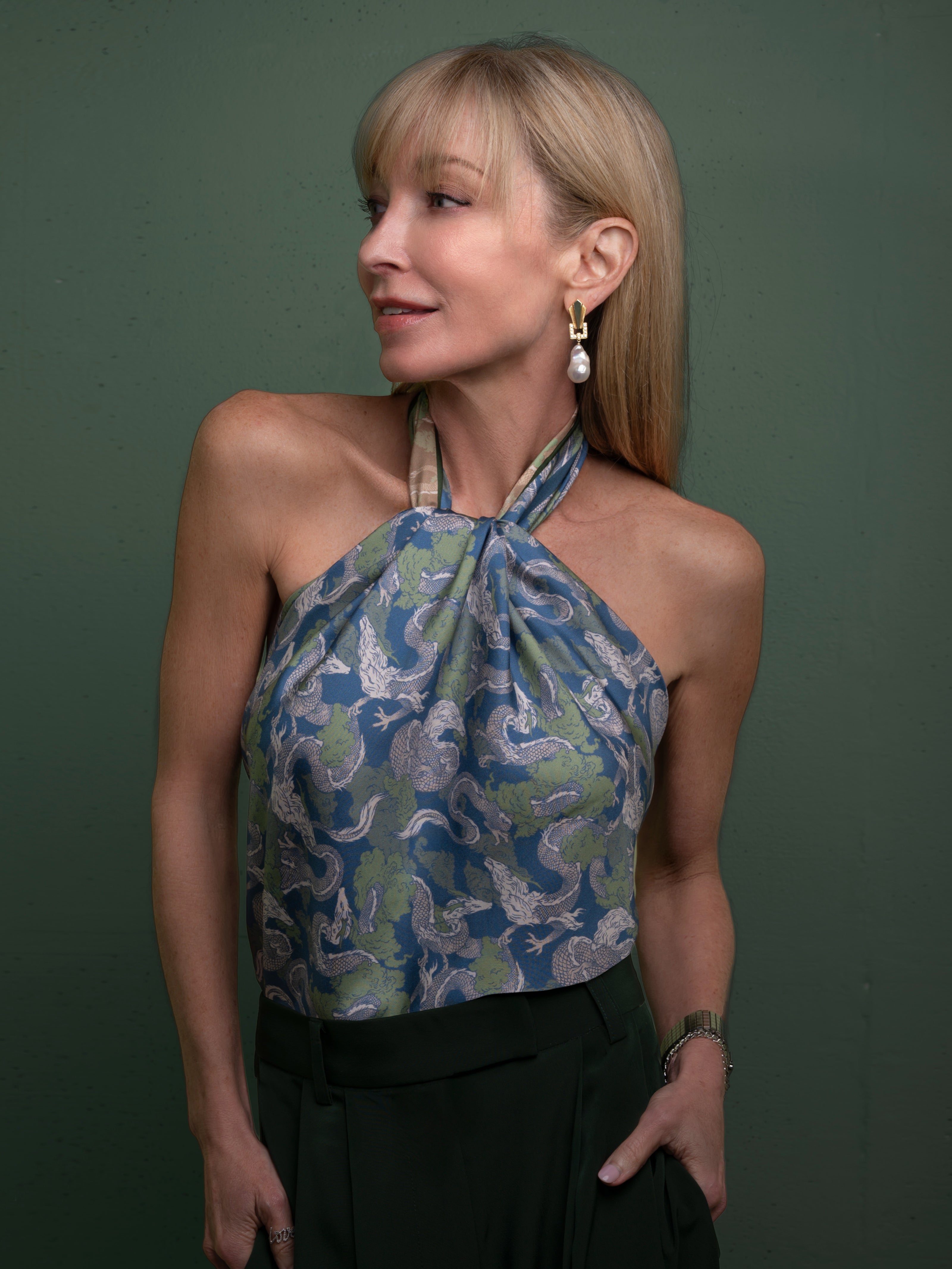 Woman wearing a silk scarf top 