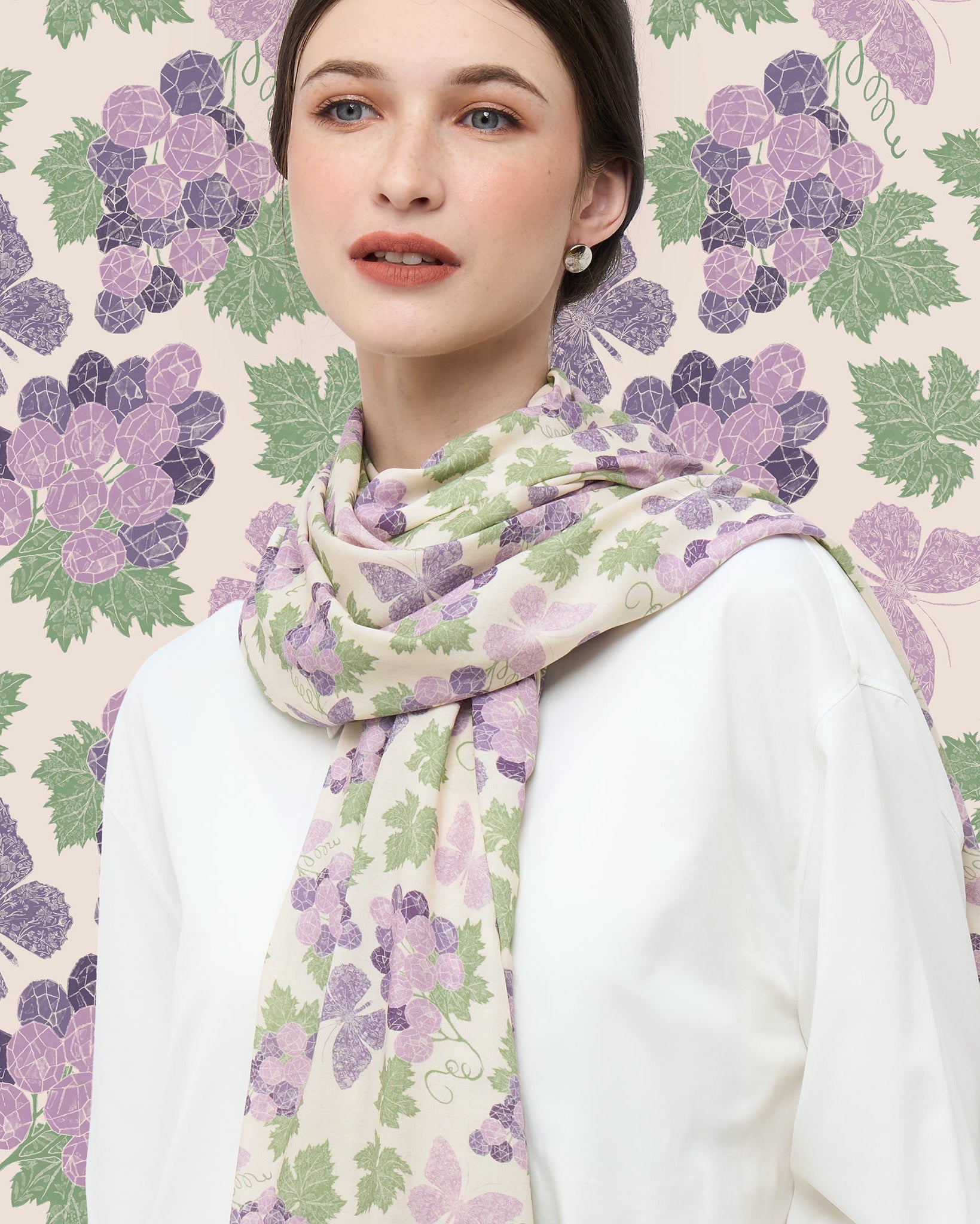 Amethyst Grapes Vanilla pareo styled as a sarong skirt — Studio Qiling wearable art luxury beach wrap Singapore