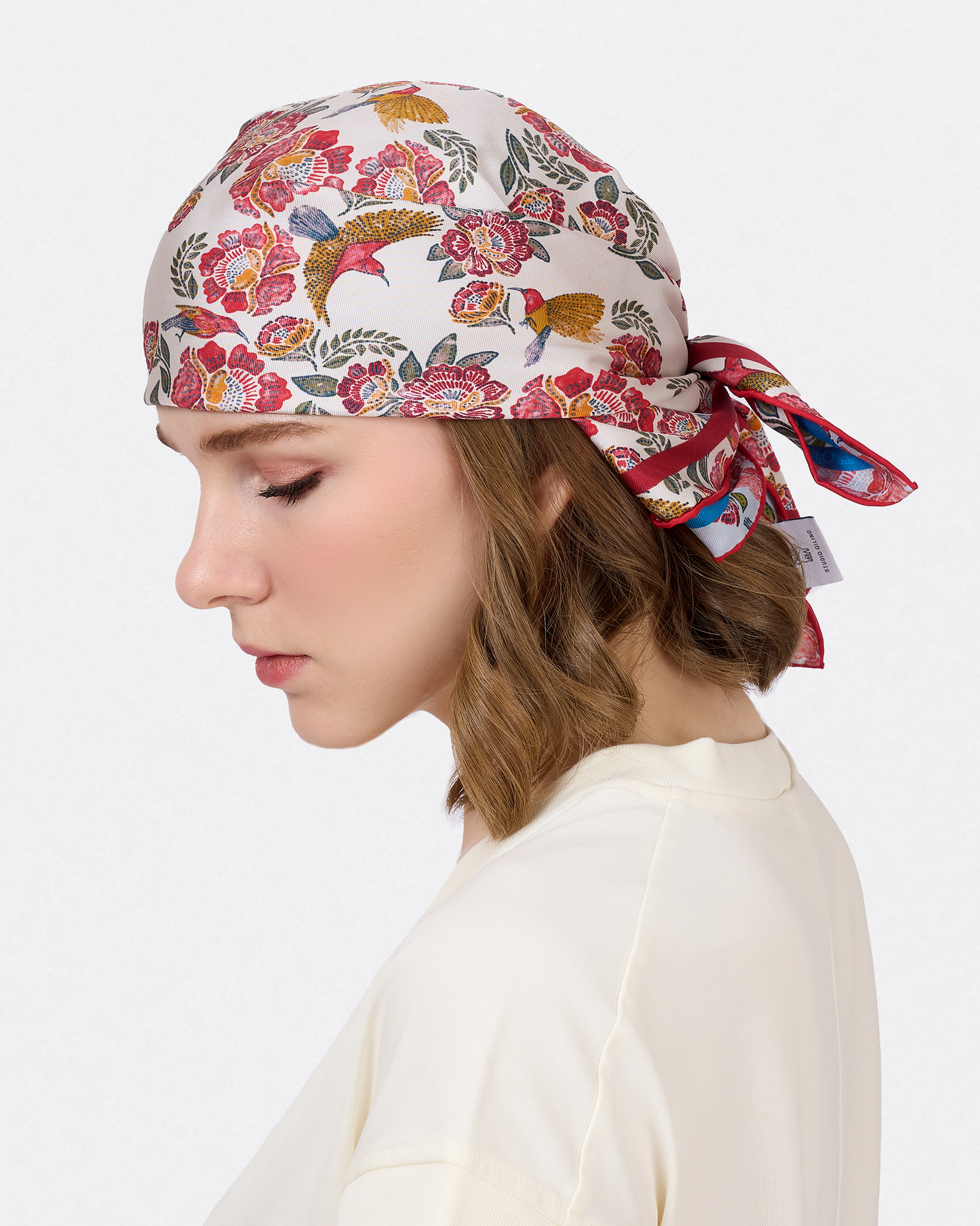 Crimson Sunbird Scarlet Sky reversible silk scarf styled as a neck scarf — Studio Qiling hand-drawn Crimson Sunbird wearable art Singapore