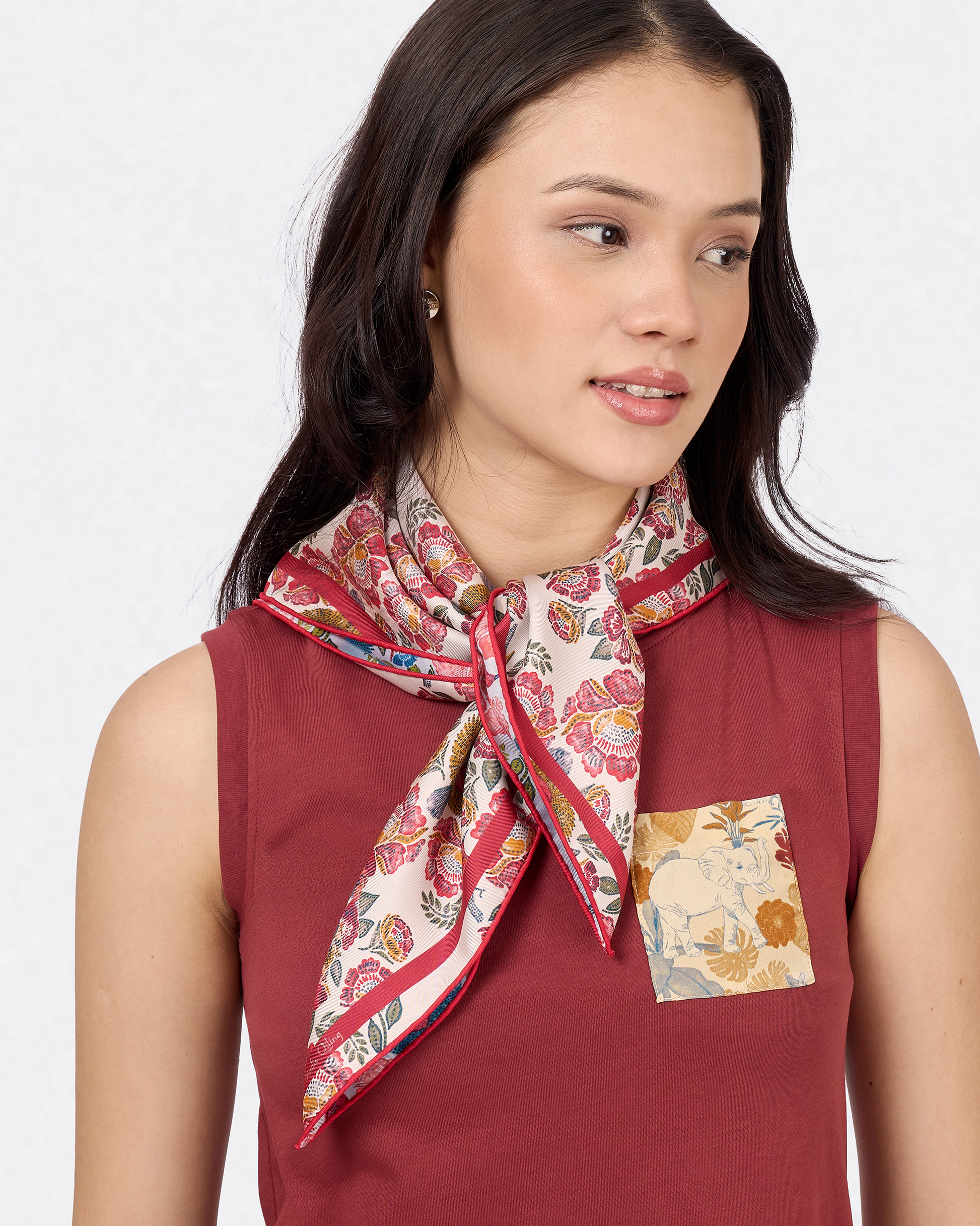 Close-up of hand-drawn Crimson Sunbird and batik florals on the Scarlet Sky silk scarf — Studio Qiling Singapore