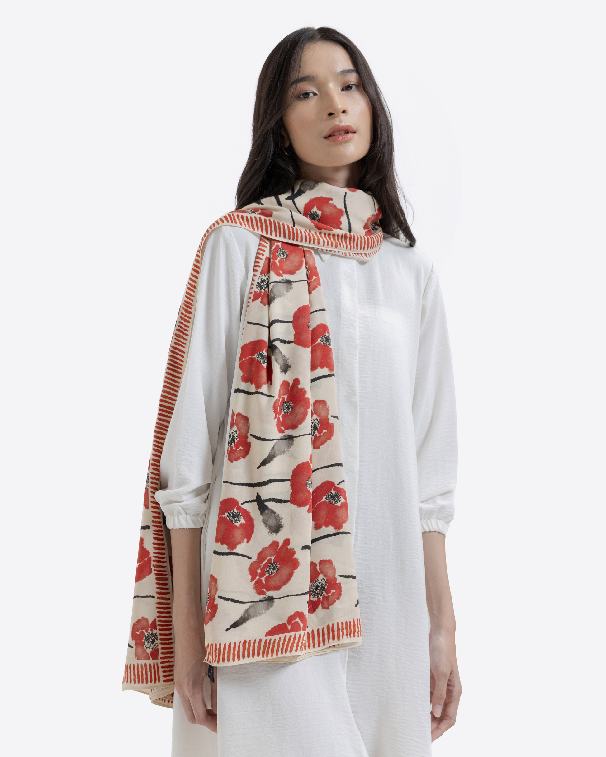 Dancing Poppies Mod pareo styled as a sarong skirt — Studio Qiling hand-drawn poppy print luxury beach wrap Singapore