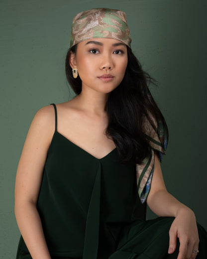 Dragon Blue Jade double-sided silk scarf worn as a headscarf — Studio Qiling hand-drawn dragon print luxury silk scarf Singapore