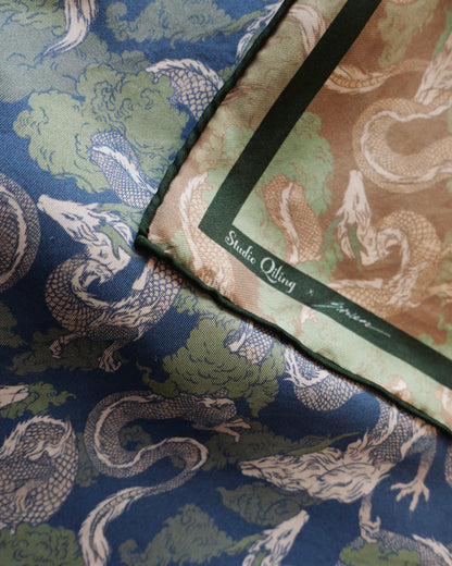 Dragon Blue Jade double-sided 100cm silk scarf laid flat showing both sides — Studio Qiling x Stolen luxury dragon print reversible scarf Singapore