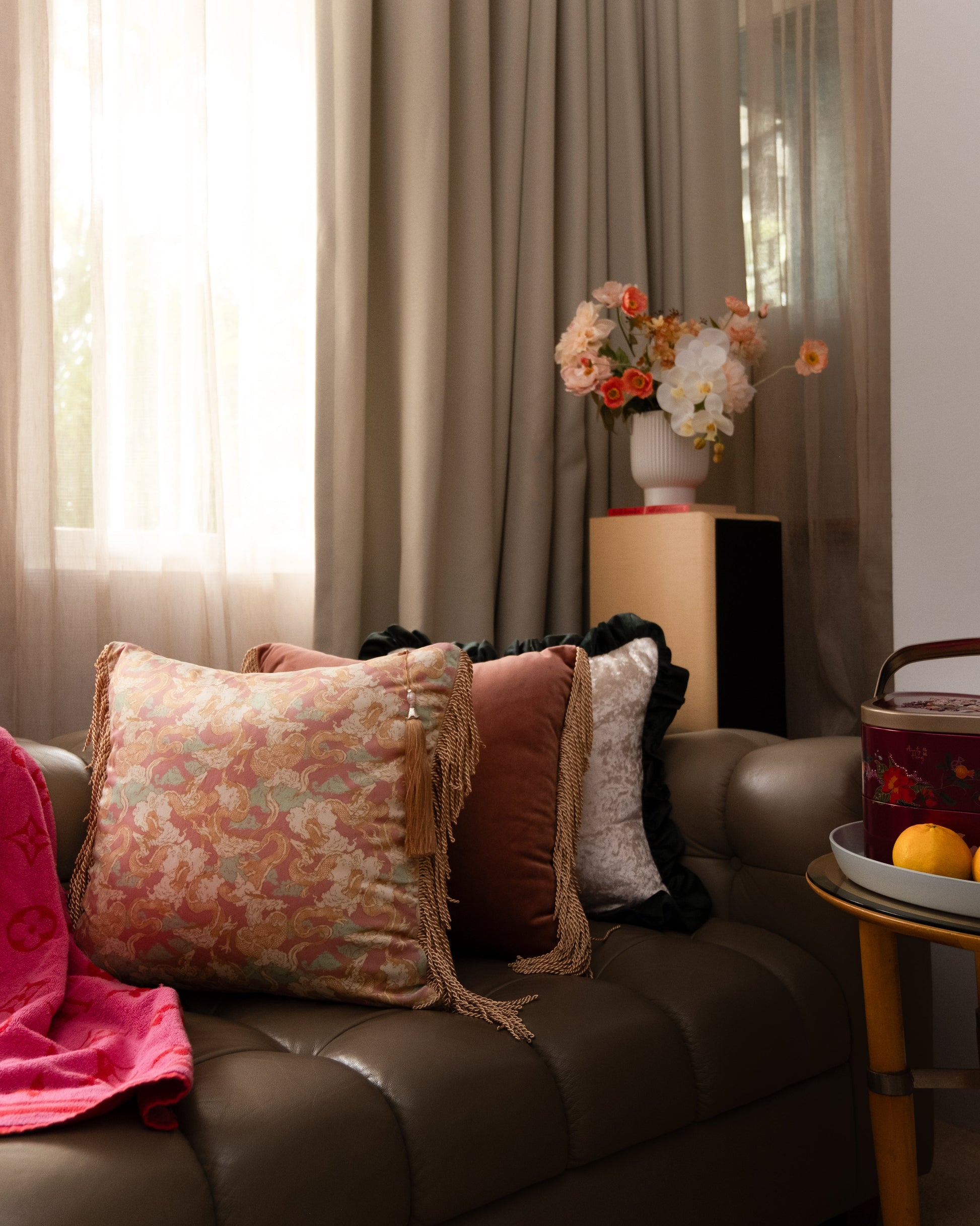 Dragon Dreams velvet cushion on a sofa — Studio Qiling x Beeyarnd hand-drawn dragon print luxury cushion Singapore