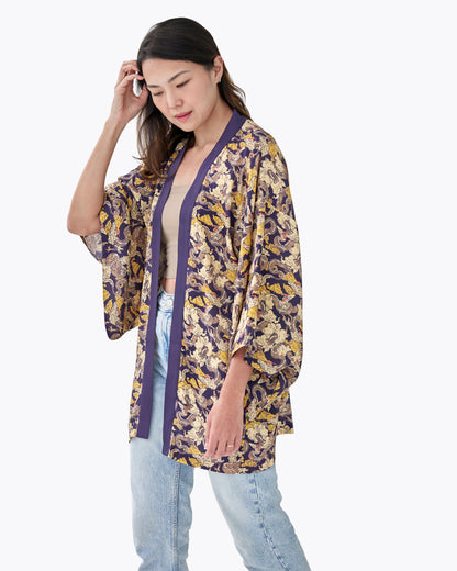 Dragon Golden Eclipse silk blend kimono styled as a beach cover up — Studio Qiling wearable art luxury outerwear Singapore
