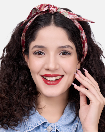 Woman wearing Dragon Scarlet silk bandeau as a hair tie — Studio Qiling hand-drawn dragon print luxury silk bandeau Singapore