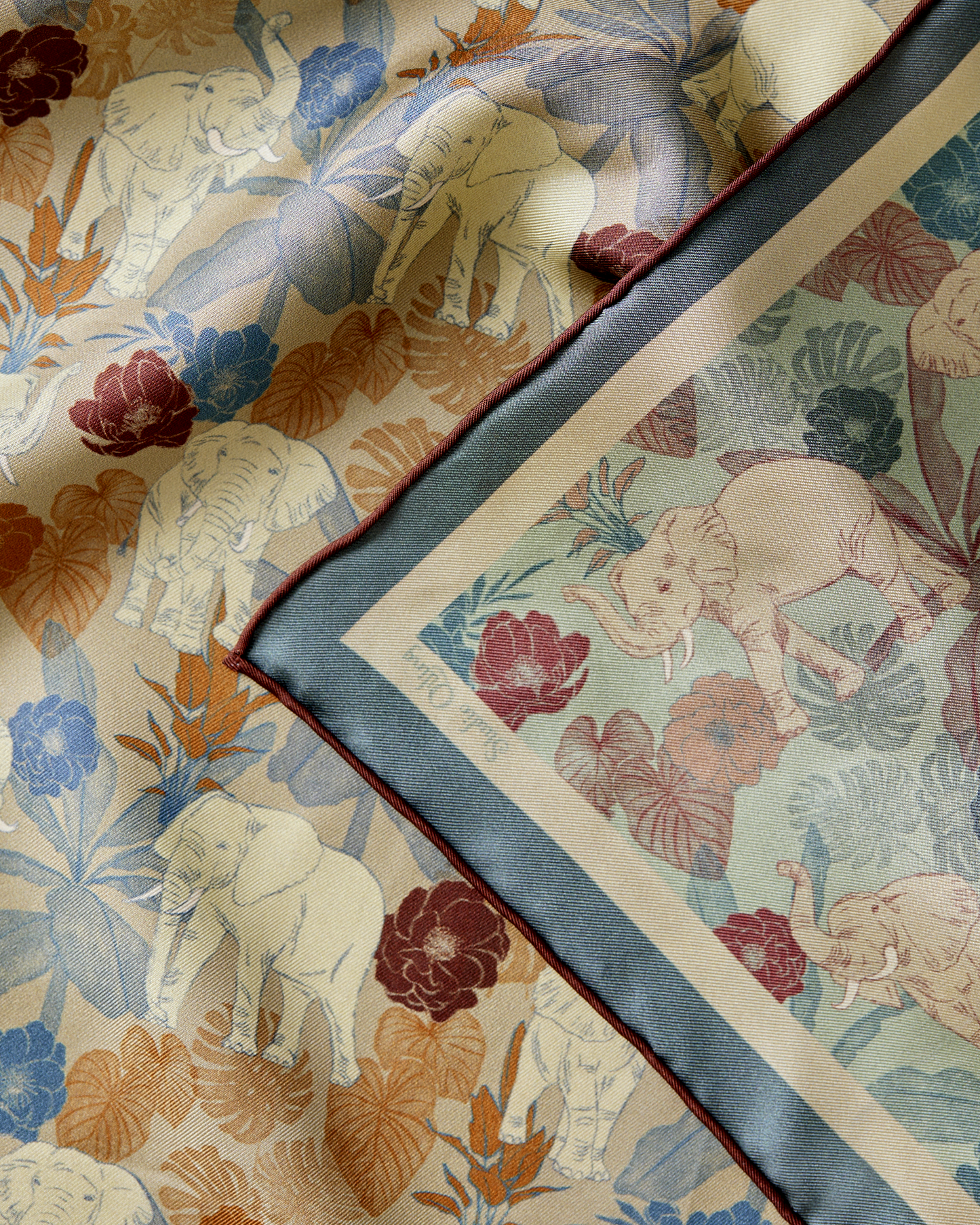 Elephant Teal Woods reversible silk scarf laid flat showing both sides — Studio Qiling luxury wearable art scarf Singapore