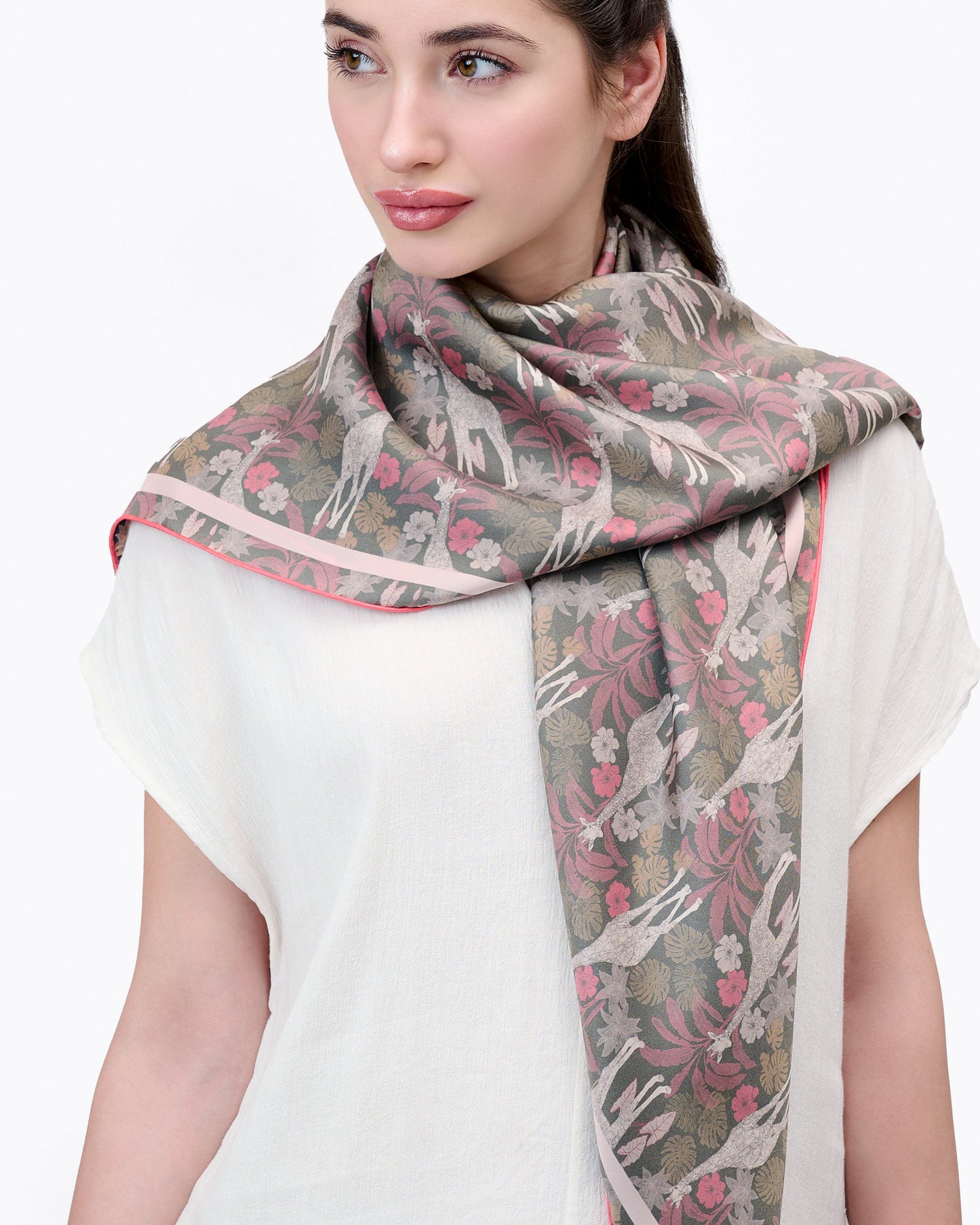 Close-up of hand-drawn giraffe motif on Giraffe Safari reversible silk scarf — Studio Qiling Singapore designer luxury scarf