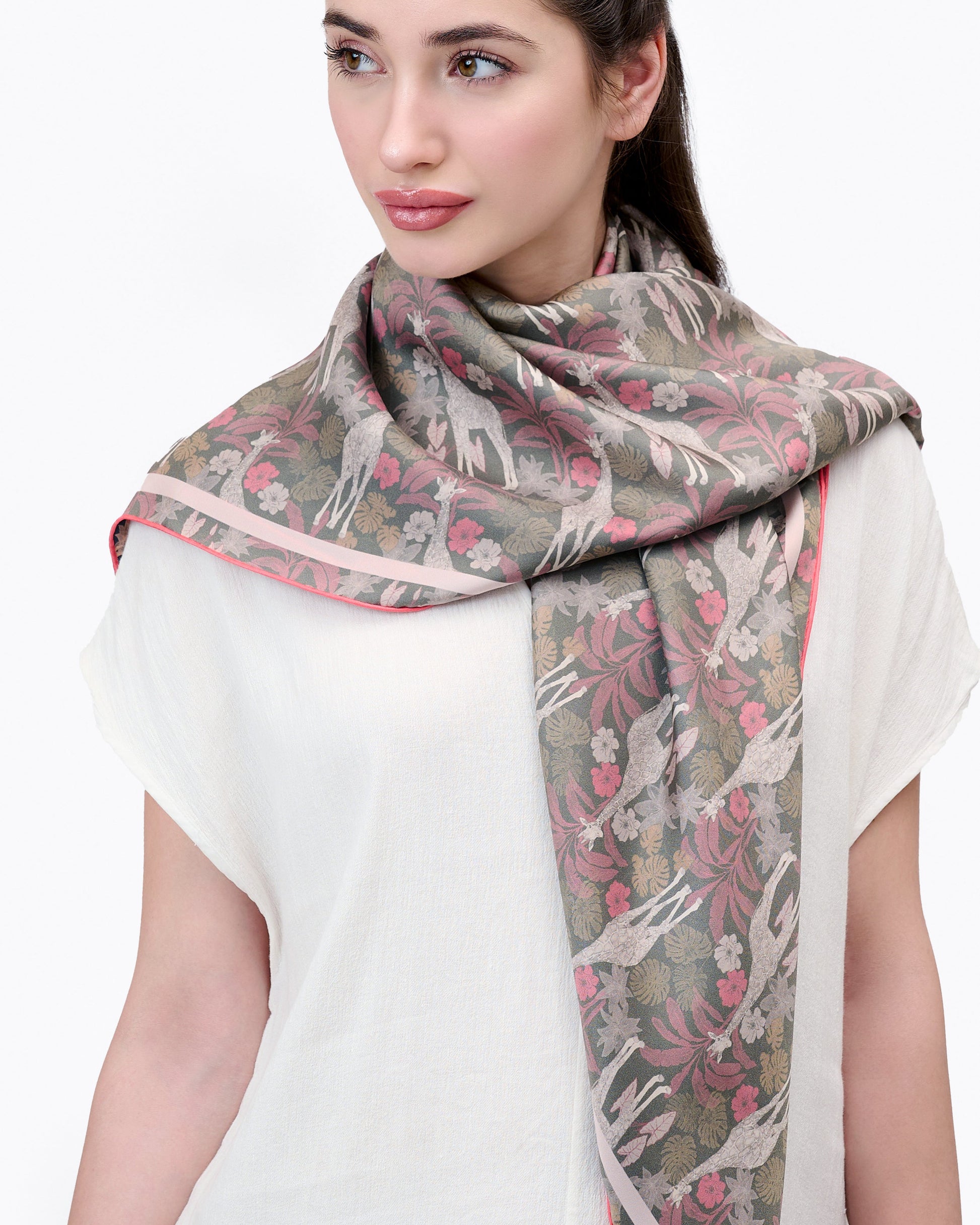 Close-up of hand-drawn giraffe motif on Giraffe Safari reversible silk scarf — Studio Qiling Singapore designer luxury scarf