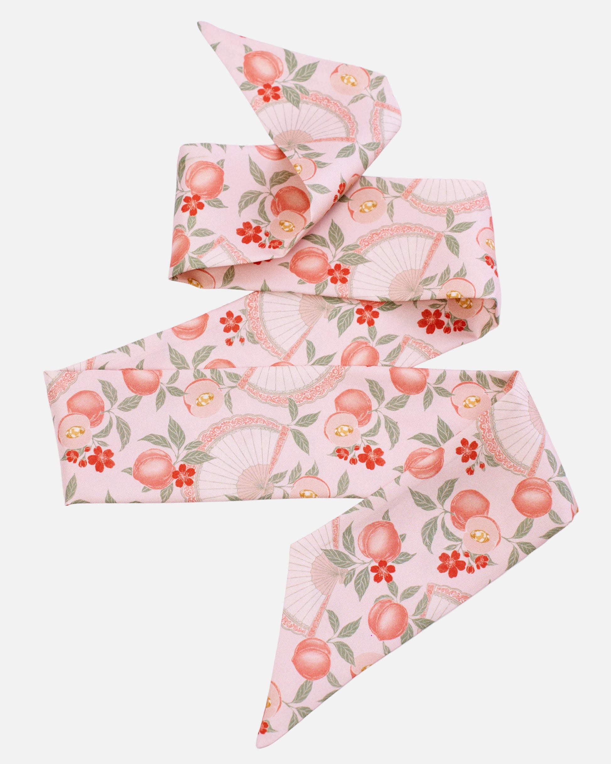 Woman wearing Golden Peaches Pink silk bandeau as a hair tie — Studio Qiling hand-drawn auspicious print luxury silk bandeau Singapore