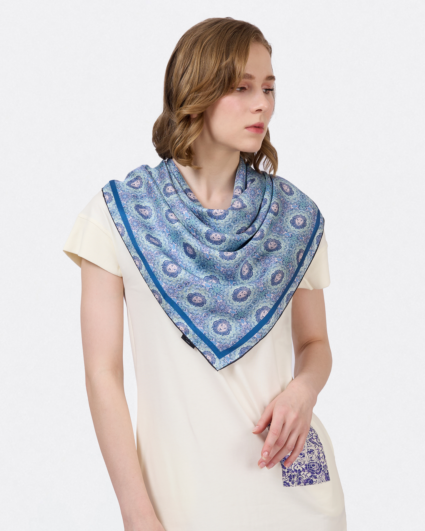 Lion Mandala Plum Frost reversible silk scarf styled as a neck scarf — Studio Qiling hand-drawn lion and mandala wearable art Singapore