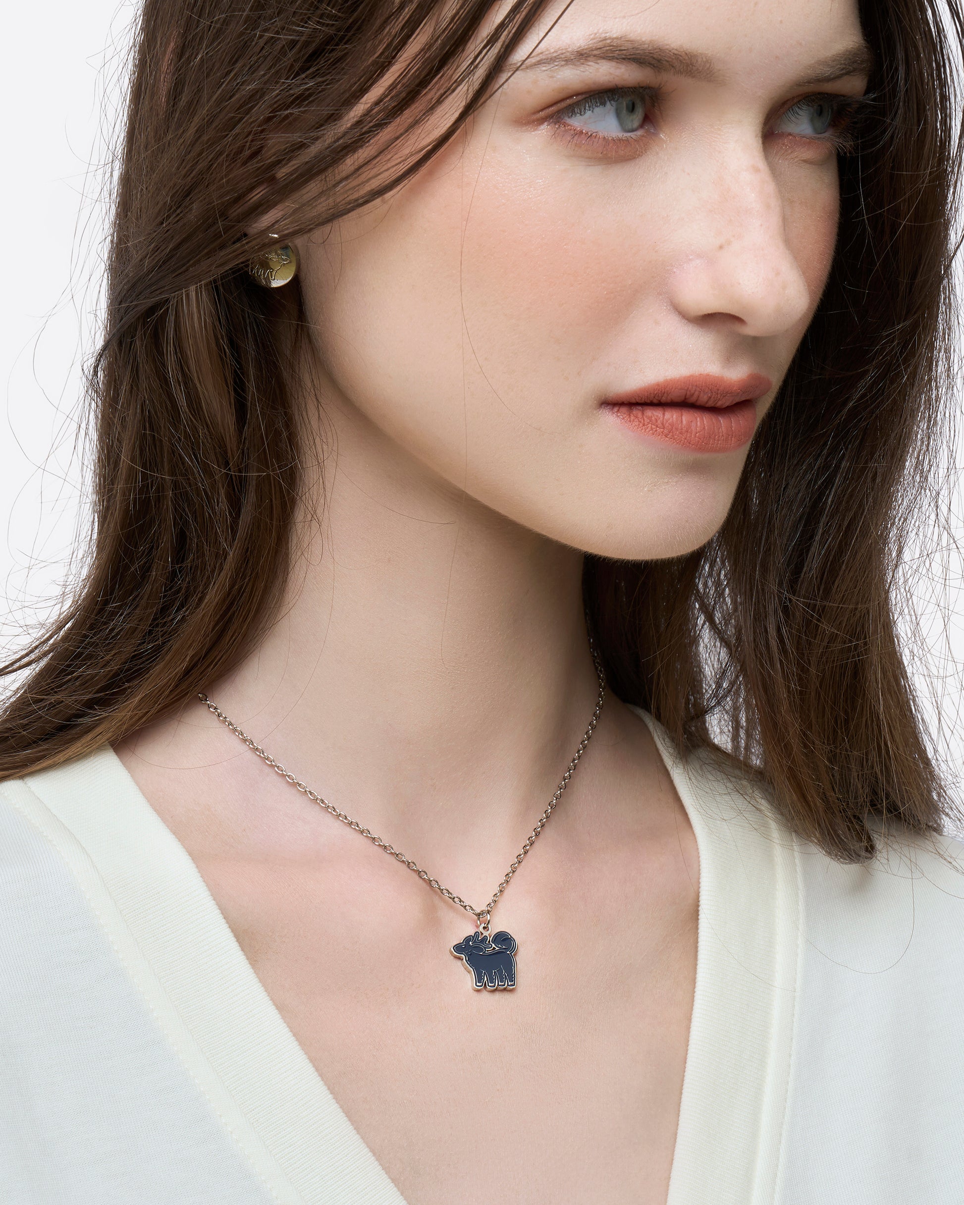 Midnight Rouge Qiling Duo necklace laid flat showing reversible pendant — Studio Qiling designer necklace Singapore