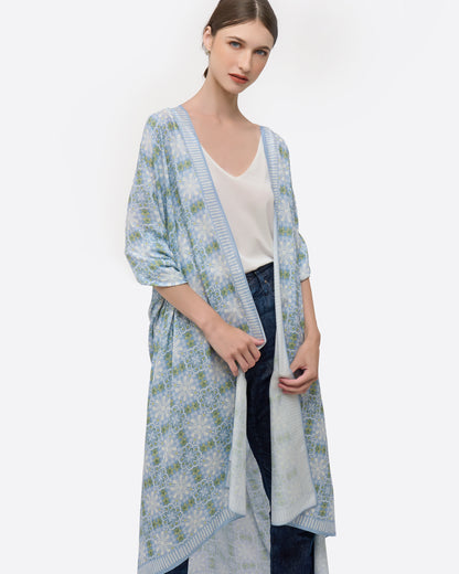 Woman wearing Peranakan Orchid Cornflower pareo as a halter dress — Studio Qiling hand-drawn Peranakan heritage luxury pareo Singapore