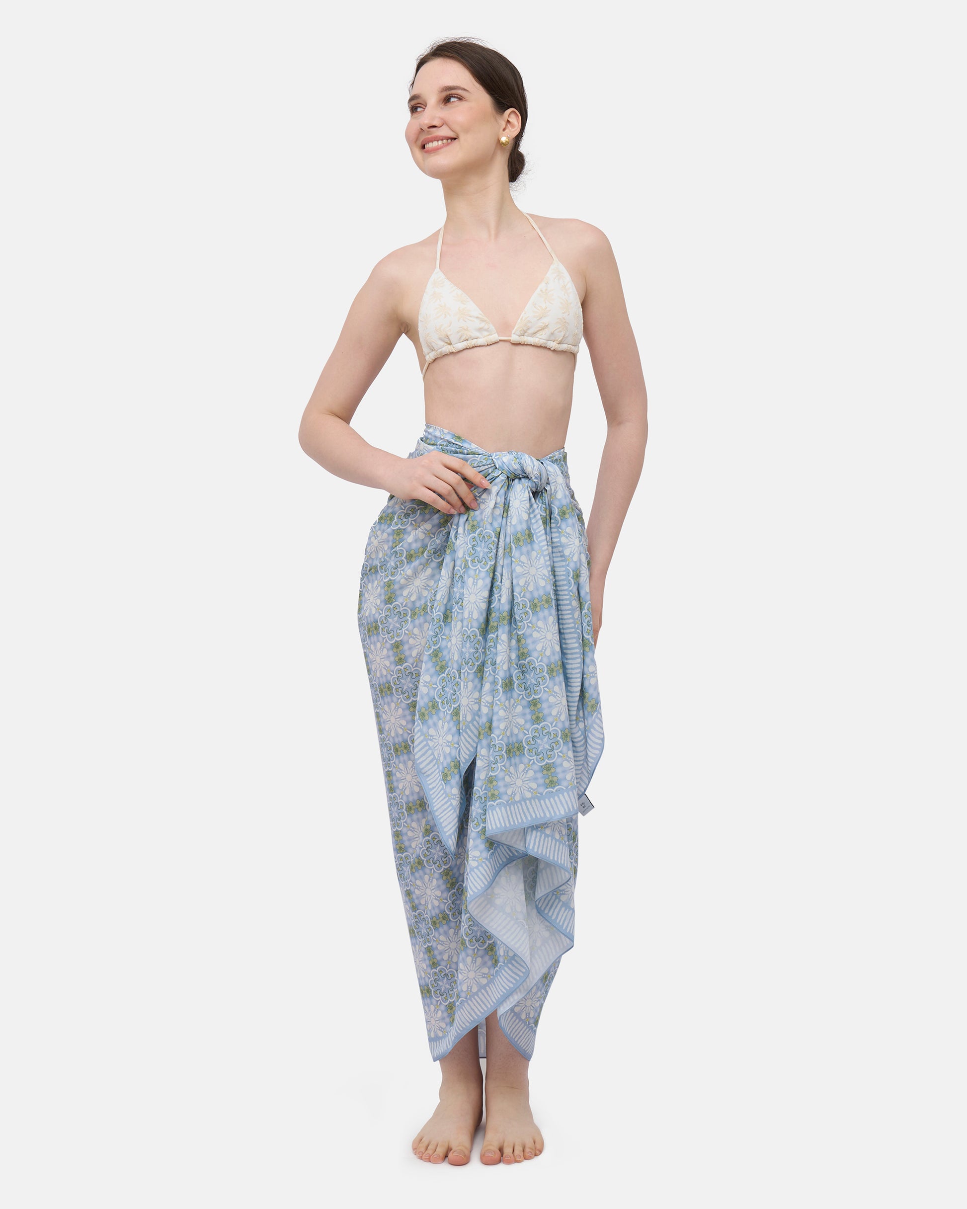 Peranakan Orchid Cornflower pareo styled as a sarong skirt — Studio Qiling wearable art Peranakan heritage beach wrap Singapore