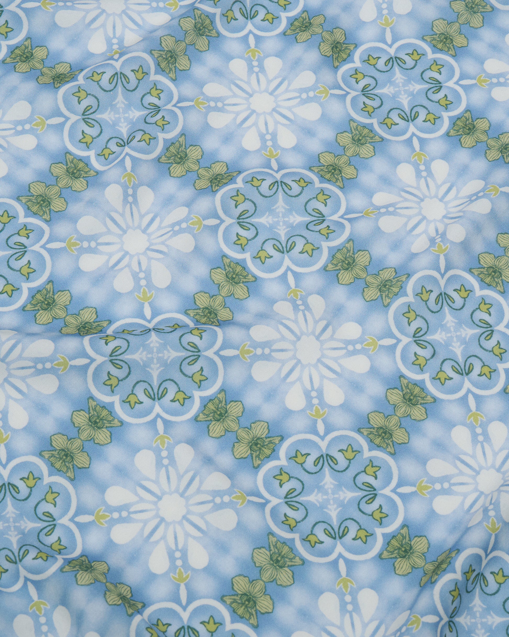 Peranakan Orchid Cornflower pareo laid flat — Studio Qiling hand-drawn Peranakan print luxury resort beach wrap Singapore