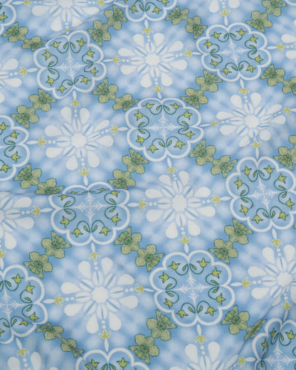 Peranakan Orchid Cornflower pareo laid flat — Studio Qiling hand-drawn Peranakan print luxury resort beach wrap Singapore
