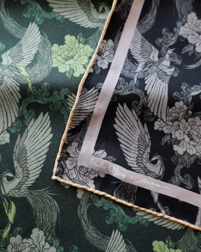 Phoenix Night Jade reversible silk scarf laid flat showing both sides — Studio Qiling hand-drawn phoenix print double-sided luxury scarf Singapore