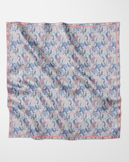 Phoenix Sakura Sky reversible silk scarf laid flat showing both sides — Studio Qiling double-sided luxury scarf Singapore