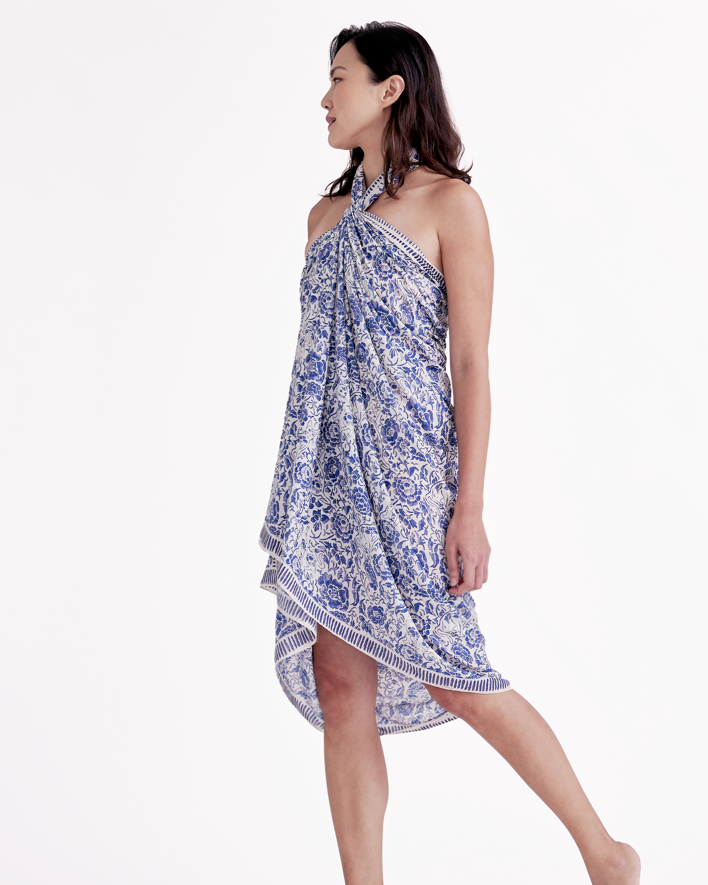 Close-up of hand-drawn Porcelain Cat and floral motif on pareo — Studio Qiling Peranakan-inspired luxury beach wrap Singapore