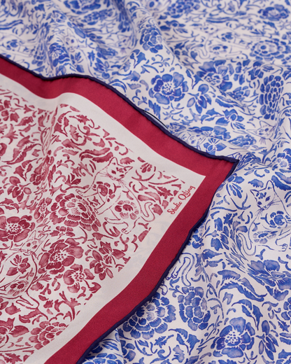 Porcelain Cat Classic Red reversible silk scarf laid flat showing both sides — Studio Qiling double-sided luxury scarf Singapore