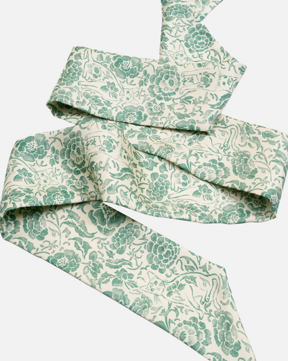 Woman wearing Porcelain Cat Mint silk bandeau as a hair tie — Studio Qiling hand-drawn Peranakan heritage luxury silk bandeau Singapore