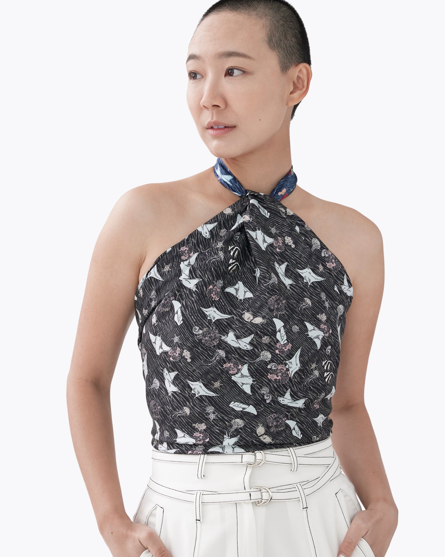 Woman wearing Pura Vida reversible silk scarf as a neck wrap — Studio Qiling x Julie Tan hand-drawn luxury scarf Singapore