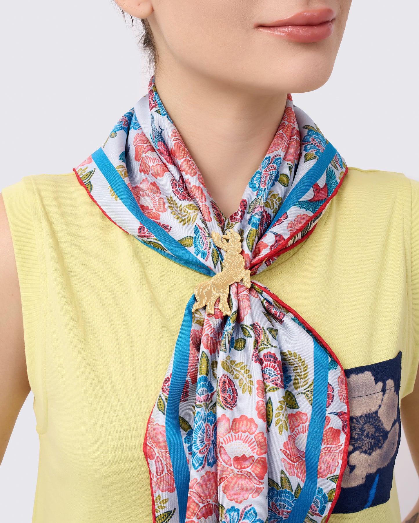 Qiling Courbette gold scarf ring styled with a silk scarf — Studio Qiling luxury scarf accessory Singapore