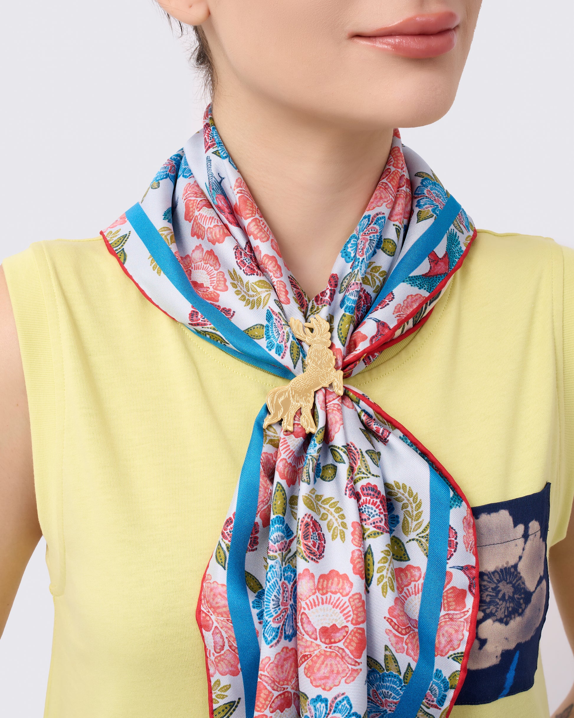 Qiling Courbette gold scarf ring styled with a silk scarf — Studio Qiling luxury scarf accessory Singapore