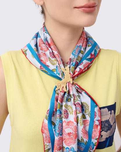 Qiling Courbette gold scarf ring styled with a silk scarf — Studio Qiling luxury scarf accessory Singapore