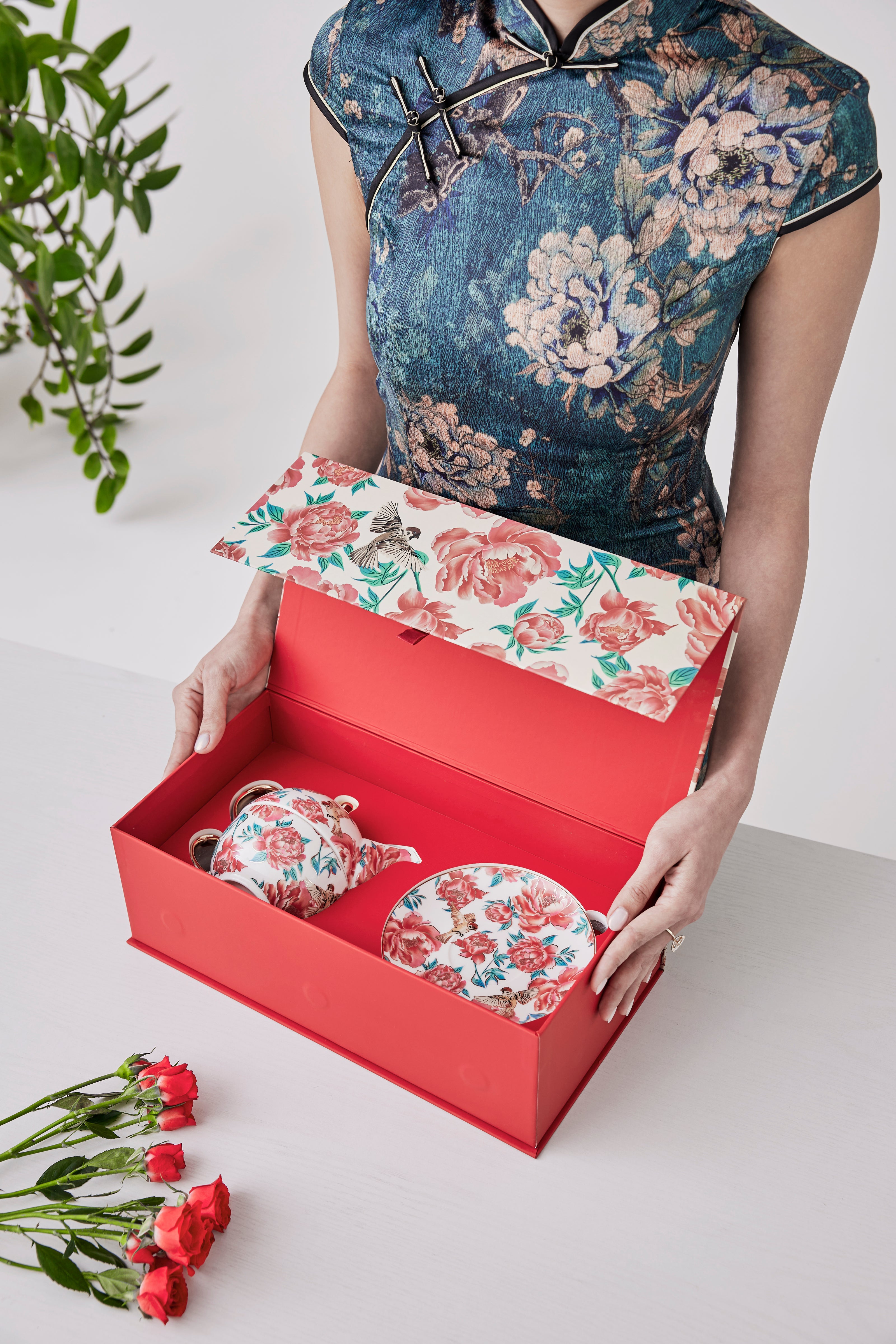 Bespoke porcelain stacked tea set with customised peonies and sparrows print, premium Mid-Autumn corporate gift by Studio Qiling for Resorts World Sentosa