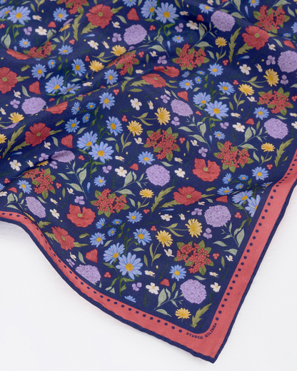 Woman wearing the Rustic Bloom Navy silk-cotton bandana as a neck scarf — Studio Qiling hand-drawn wild florals bandana Singapore