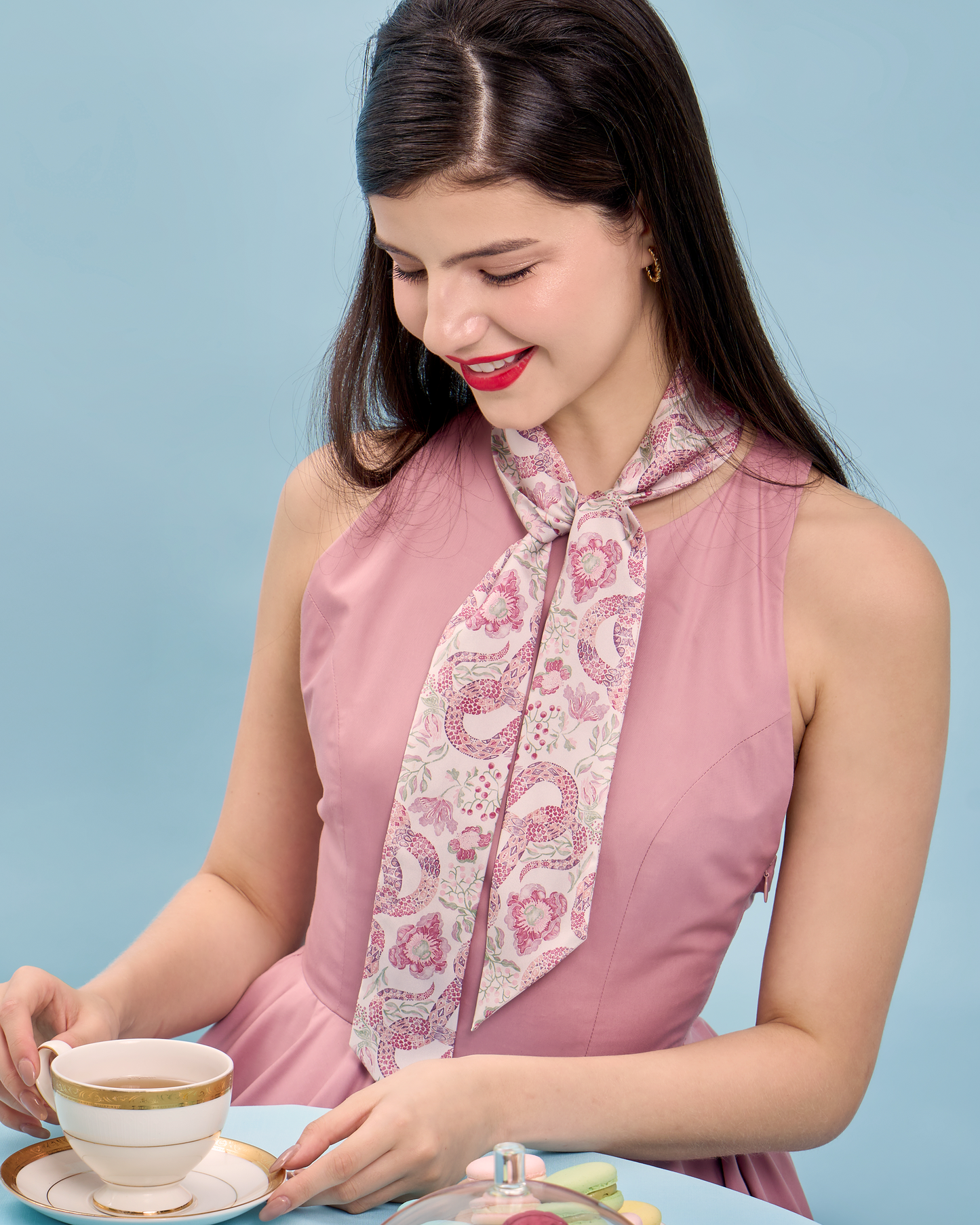 Woman wearing Serpentine Blossom silk bandeau as a hair tie — Studio Qiling hand-drawn mythical creature luxury silk bandeau Singapore