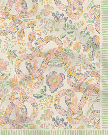 Serpentine Spring pareo laid flat — Studio Qiling hand-drawn mythical creature luxury beach wrap Singapore