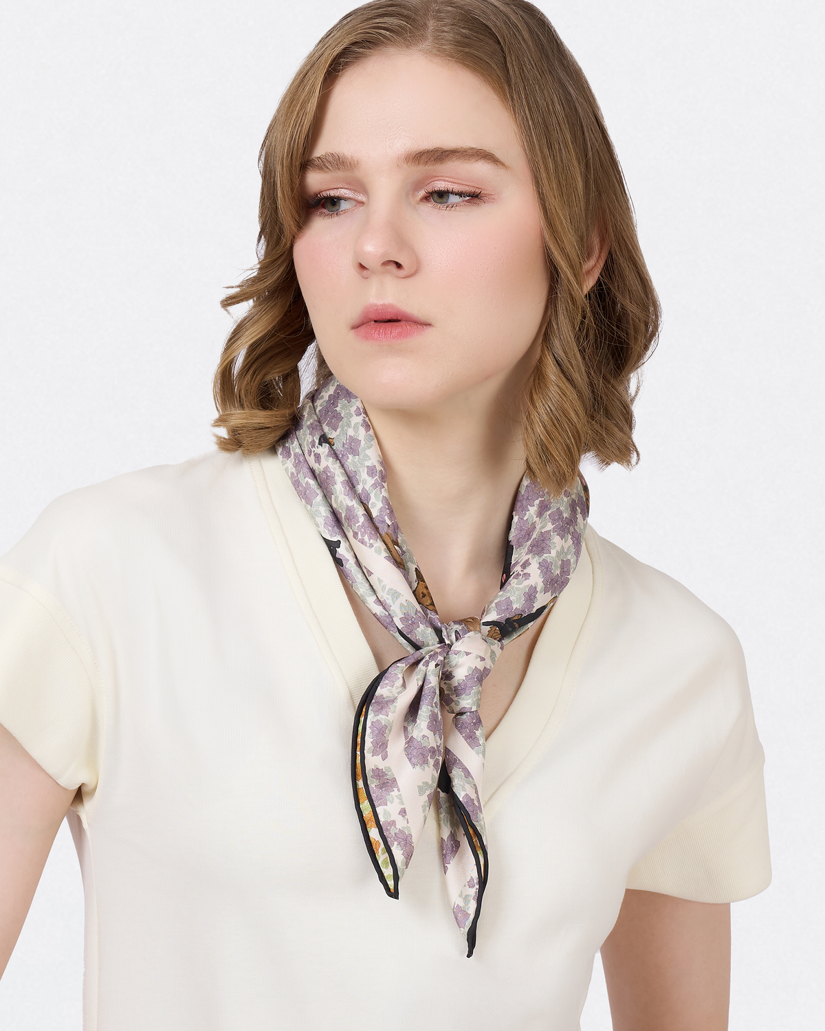 Close-up of hand-drawn Singapore Special dog and bougainvillea on the Lilac Summer silk scarf — Studio Qiling Singapore