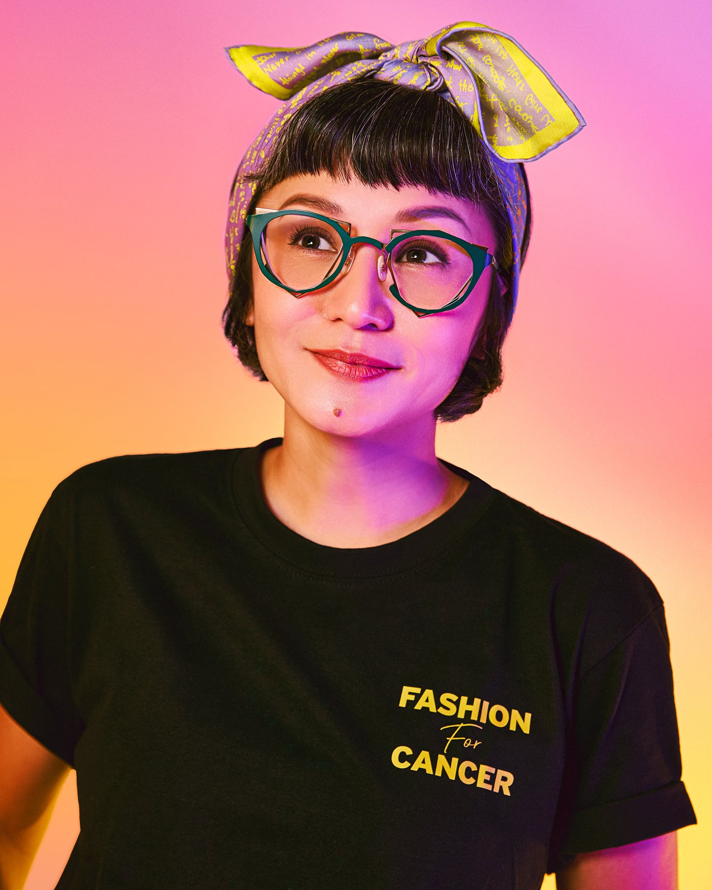 Woman wearing Stories of Hope reversible silk scarf as a neck wrap — Studio Qiling Fashion for Cancer charity silk scarf Singapore