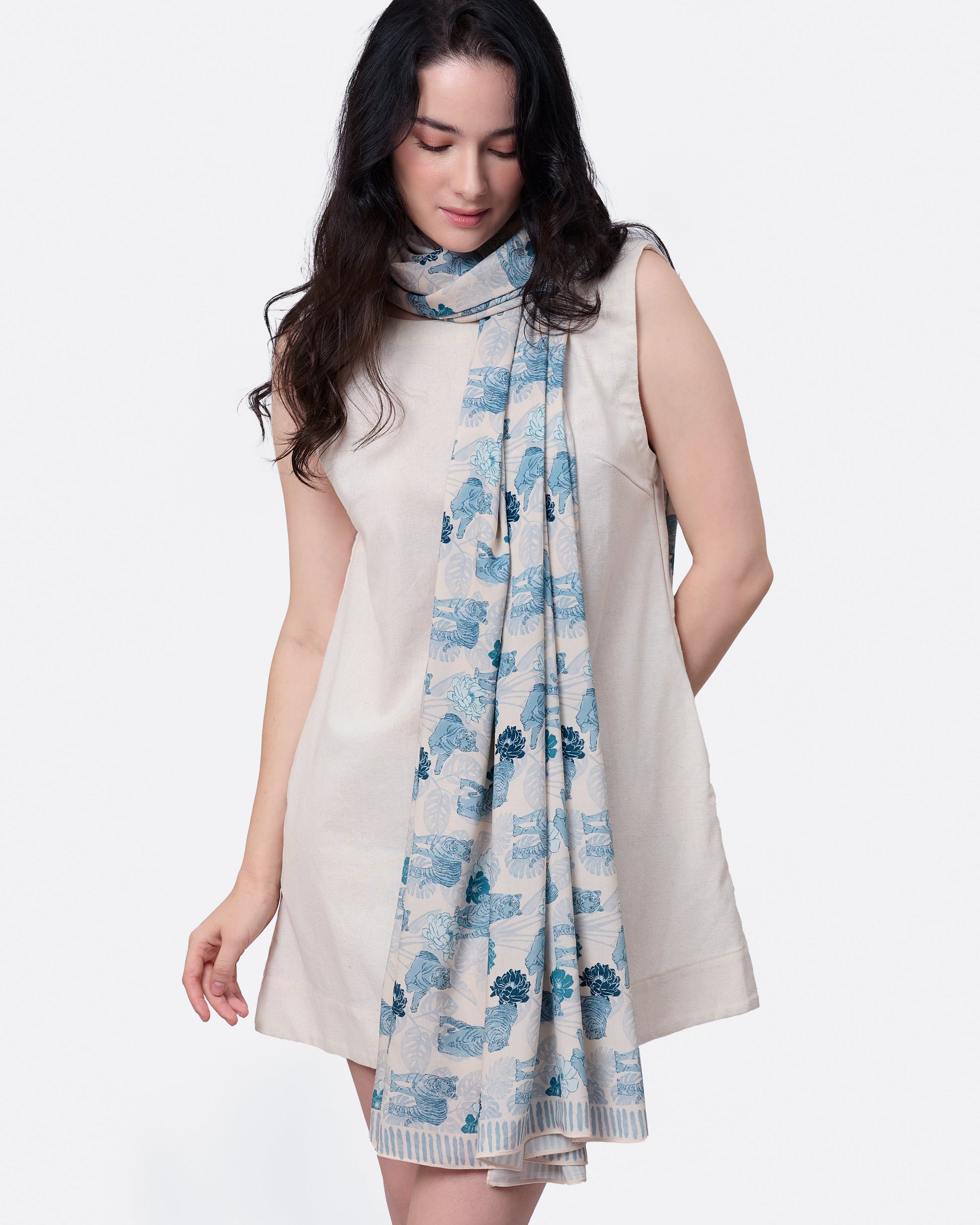 Tiger Blue pareo styled as a sarong skirt — Studio Qiling wearable art luxury beach wrap Singapore
