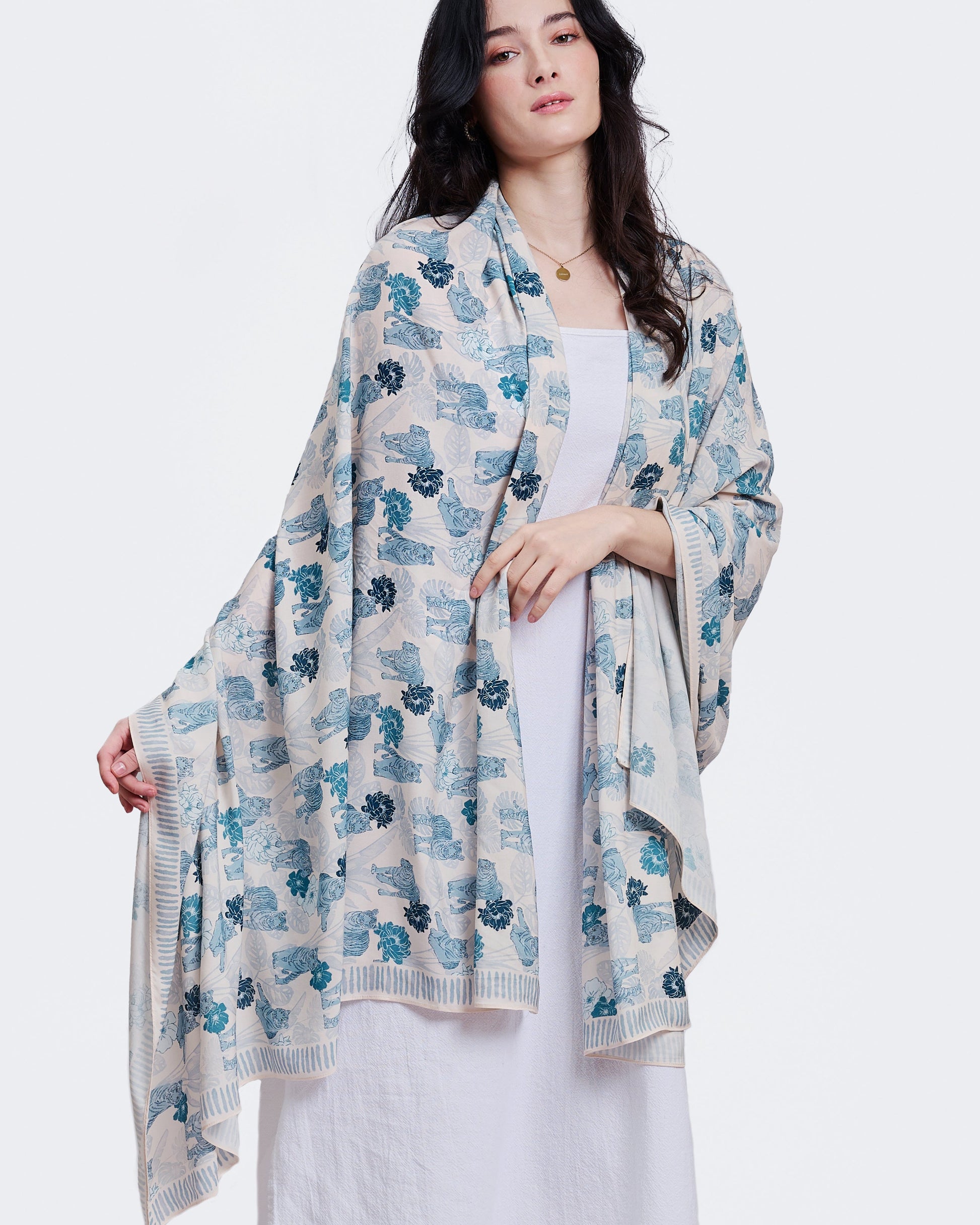Close-up of hand-drawn tiger motif on Tiger Blue pareo — Studio Qiling luxury artist print beach wrap Singapore