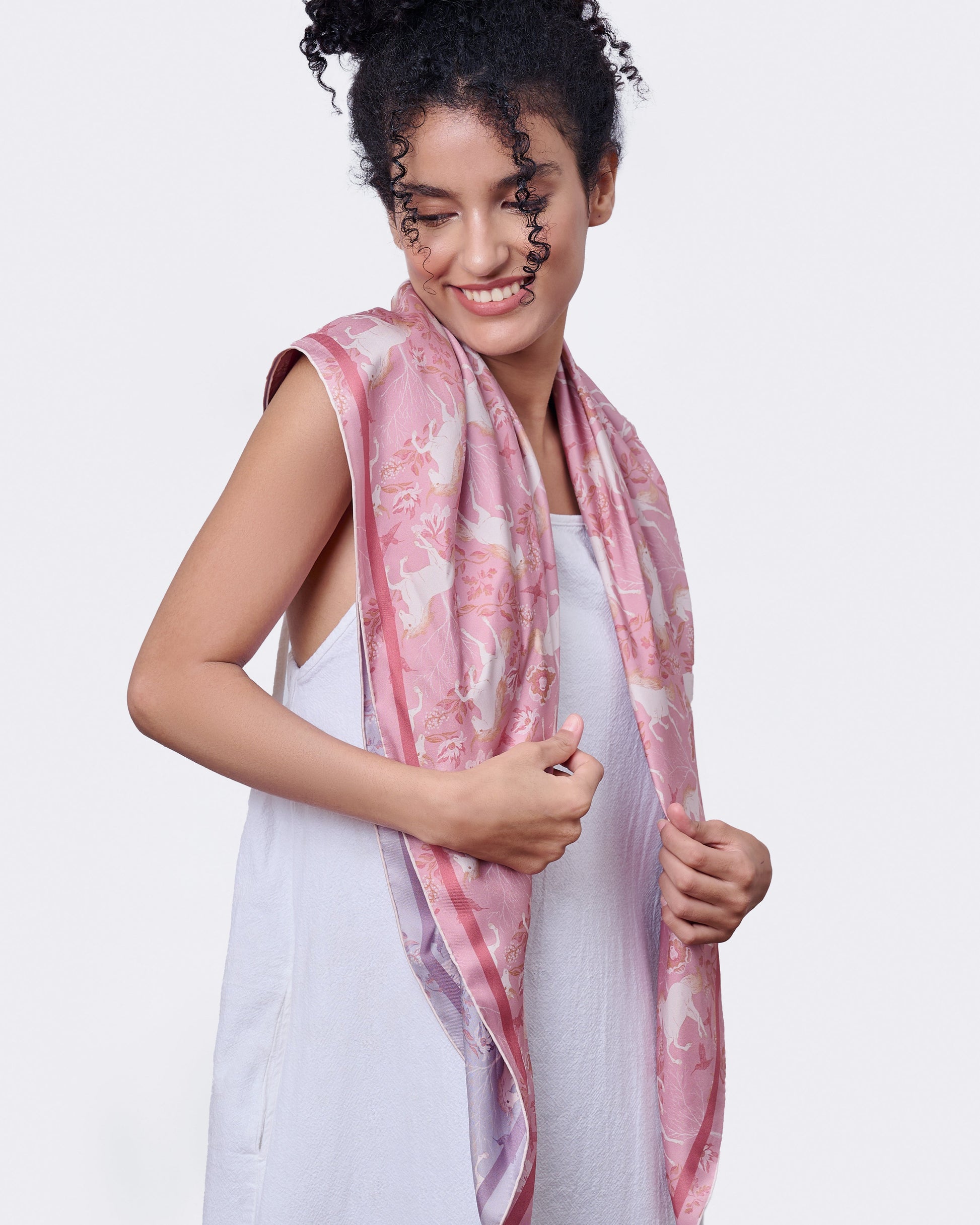 Unicorn Spring Magic reversible silk scarf laid flat showing both sides — Studio Qiling double-sided luxury scarf Singapore