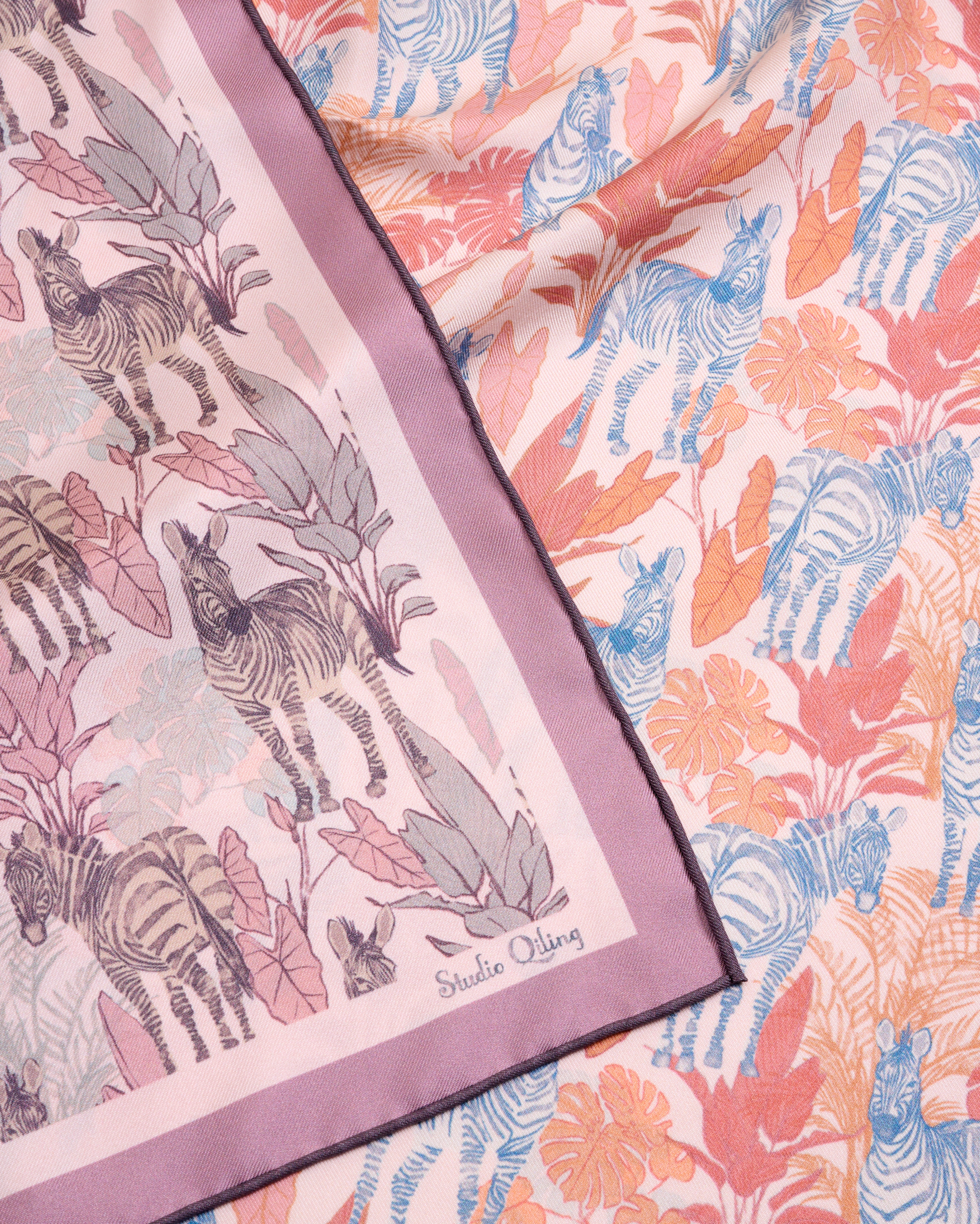 Zebra Lilac Spring reversible silk scarf laid flat showing both sides — Studio Qiling double-sided luxury scarf Singapore