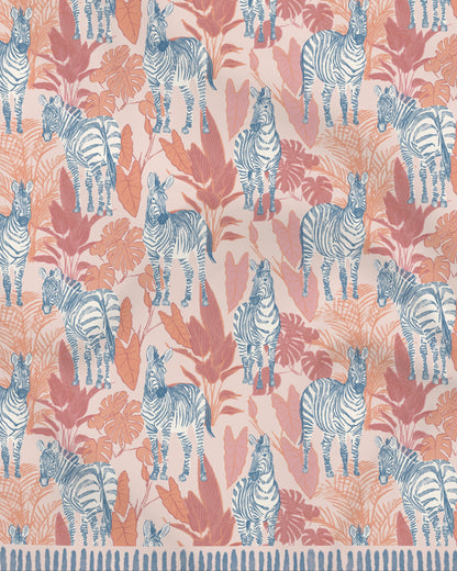 Zebra Sunset pareo laid flat — Studio Qiling hand-drawn zebra print luxury resort beach wrap Singapore